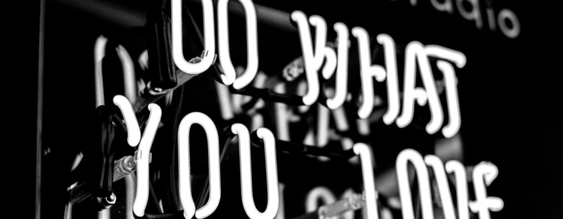 greyscale photo of DO What YOu Love signage