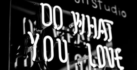 greyscale photo of DO What YOu Love signage